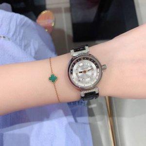 The new Lv Tambour watch is unlike any other. The twelve letters of "Louis Vuitt The new Lv Tambour watch is unlike any other. The twelve letters of "Louis Vuitt