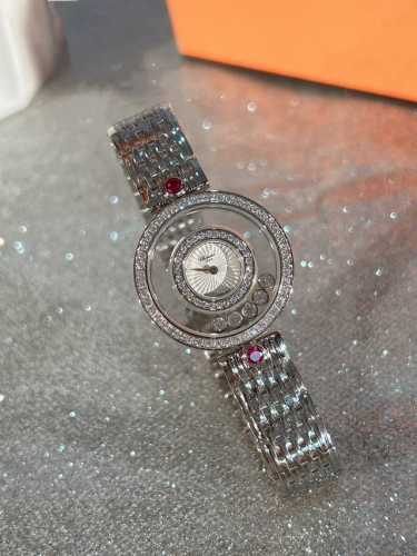 Chopard's latest watch strap, the Happy Diamonds collection, features a round Ha