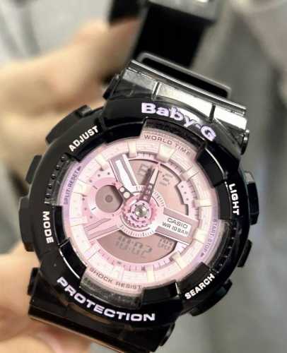 It turns out to be the black and purple of Casio Baby-G, which is the color of