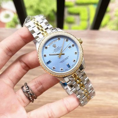 The new Rolex Xt1 Dual Calendar with 6 and 9 diamond bezels is a unique men's w