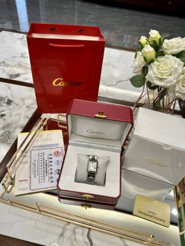 With The Same Packaging As The Picture Cartier Tank Steel Strap Watch Returned A