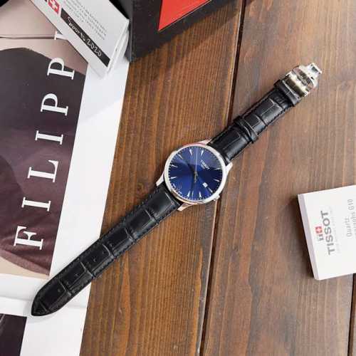 Tissot T063 Leather Strap Model, Elegant Series. A minimalist dial design, 42mm