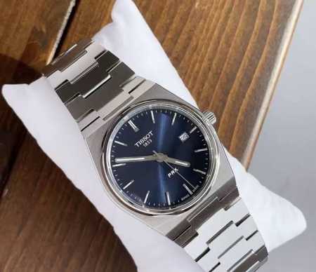 Unboxing a Tissot Prx series watch! The black dial and steel bracelet are classi - Click Image to Close