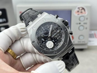 Audemars Piguet Royal Oak 26238 with rubber, leather, and steel straps. Featurin