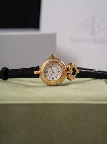 Gold and White Same Price The Van Cleef & Arpels Charms Gold series watch, a cla