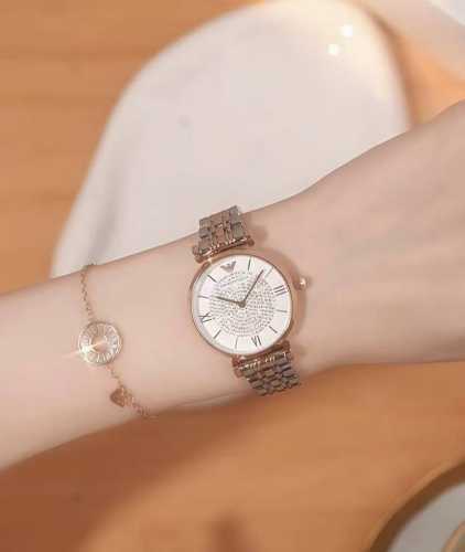 The incredibly popular Armani All Stars watch, featuring a rose gold steel band