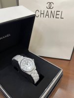 White digital hour markers with a calendar, Chanel J12 series, imported Swiss m