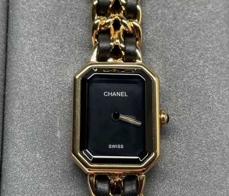 This black and gold sugar cube watch has accompanied me from the workplace to d - Click Image to Close