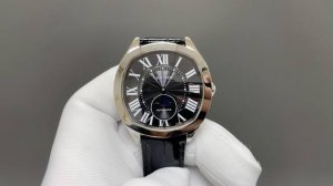 Cartier Drive De Cartier watch. Its elegant and solemn pillow-shaped design pair