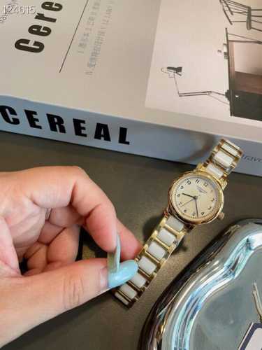 Longines Petite Gold Watch Understated yet exquisitely detailed, this watch is u