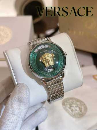 Gold and black +20 Versace's new Versace V-Tribute series features a captivating - Click Image to Close