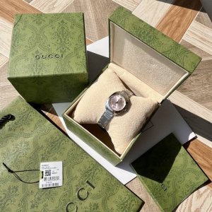 Gucci Interlocking Quartz Series. The watch has a diameter of 29mm, and the Gucc