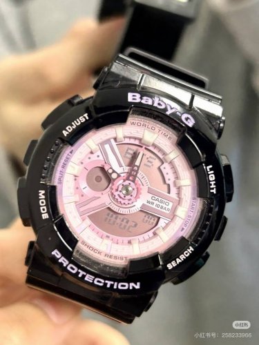 It turns out to be the black and purple of Casio Baby-G, which is the color of