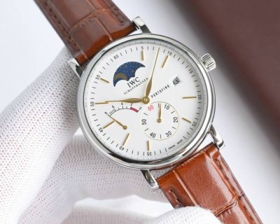 Gold + 50 IWC's most dazzling star, the IWC Long Kinetic Moon Phase Expert. This