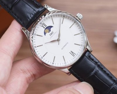 White, gold, and steel straps. 20 Men's Favorite Three-Hand Watch. Latest: IWC's