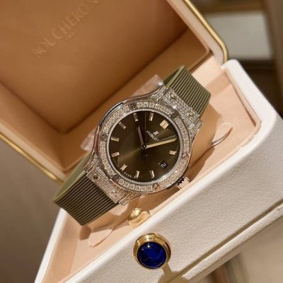 a fully diamond-encrusted, top-of-the-line replica of the Hublot Classic Fusion