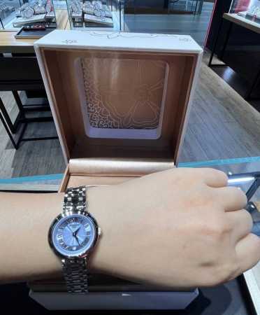 The Tissot Little Beauty 26mm quartz watch features a blue mother-of-pearl dial - Click Image to Close