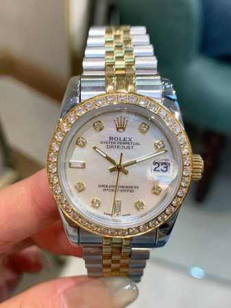 Rolex Datejust 31mm watch with a three-color dial, a timeless art piece on the - Click Image to Close
