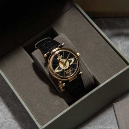 Vivienne Westwood Fashionable women's watch, innovative hollow carved Saturn rev - Click Image to Close