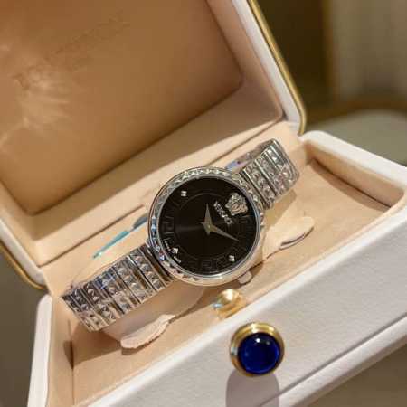 This elegant gold timepiece features a guilloch - Click Image to Close