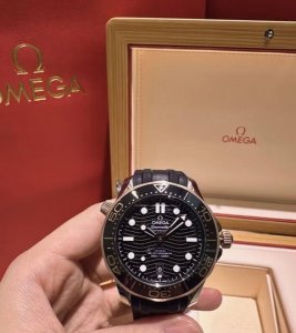 Omega, my choice Omega Seamaster 300, black and gold ceramic bezel with a black