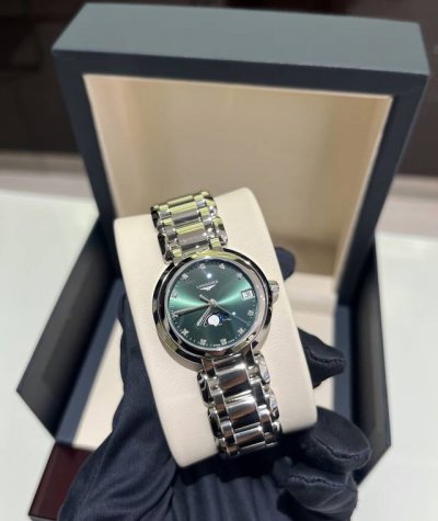This Longines Moon phase 2000 watch features an emerald green dial, a 30.5mm cry