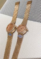 gold and white, same price. Dior La D My Dior Cd04111X1248 Cd04115X1251 watch. I