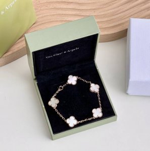 Van Cleef & Arpels "5-Flower White Mother-Of-Pearl Bracelet" Is Very Elegant. Th