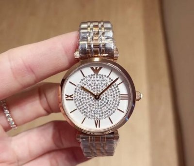 Asked about the Armani classic all-star watch, the dial is full of diamonds, th