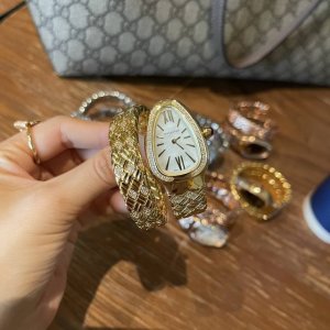 Brand: Bvlgari Serpentin Spig series watch with a unique prismatic design. Dial: