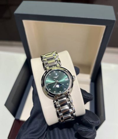 This Longines Heart Moon watch with an emerald dial features a 30.5mm watch gla