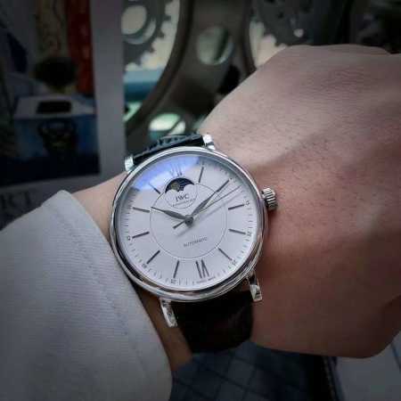 White Gold IWC Portofino Series, Model IW459401. This watch features a moon pha - Click Image to Close