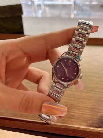 The OMEGA Seamaster Aqua Terra ladies' watch, ringed with dazzling diamonds, em - Click Image to Close