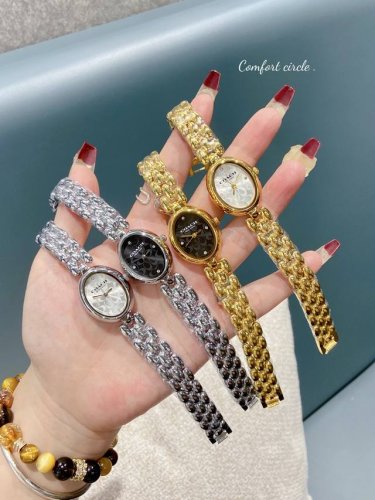 A used Coach women's watch DDD. The actual piece is incredibly classy! My gold-