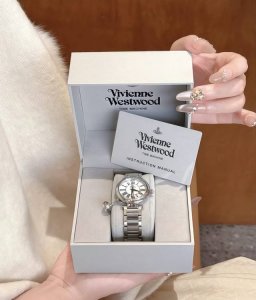 Vivienne Westwood Saturn silver watch, gives off a rich heiress vibe I'm going t
