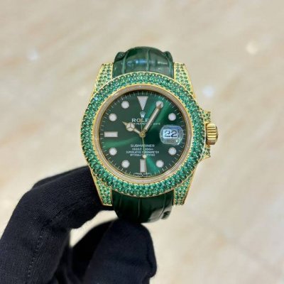 Newly modified diamond-studded Submariner watch in the gold leather densely set