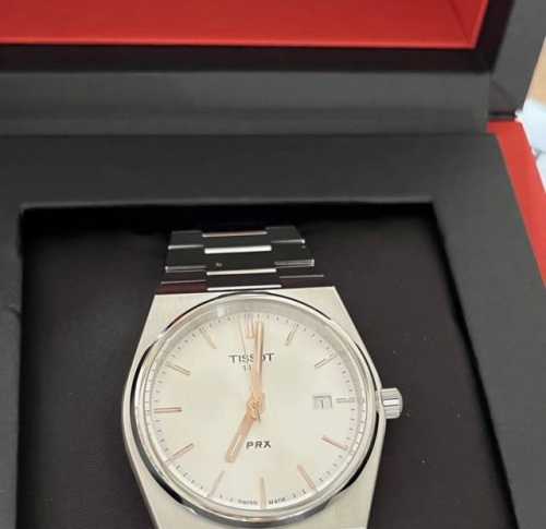 Tissot Super Player Prx silver dial quartz movement stainless steel case and str