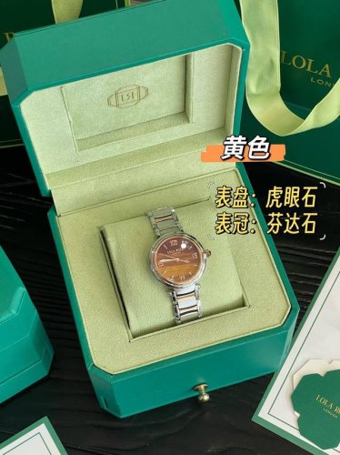 Lola's small green watch, a golden autumn blessing, has a green dial that goes