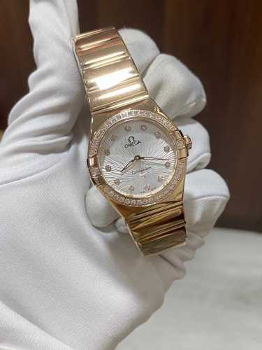 Latest model Omega Constellation 28mm quartz watch with a full rose gold case an