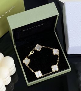 Van Cleef & Arpels' "5-Flower White Mother-Of-Pearl Bracelet" Is Very Elegant. T