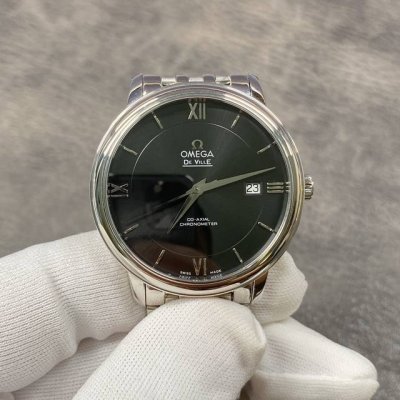 Omega De Ville series watch. Its elegant and slim profile, combined with a simp