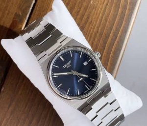 Unboxing a Tissot Prx series watch! The black dial and steel bracelet are classi