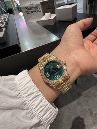 Diamond-encrusted white gold Rolex Datejust Classic Women's watch with solid st