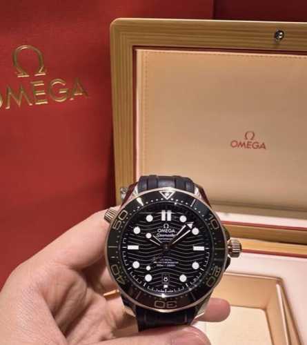 Omega, my choice Omega Seamaster 300, black and gold ceramic bezel with a black