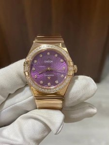 Latest model Omega Women's Constellation 28mm Quartz watch with a full rose gold