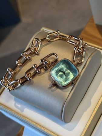 Tiffany's new watch features a diamond-cut crystal and a signature bracelet, exu - Click Image to Close