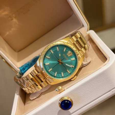 Gold Versace Millenyium Lady watch, featuring the brand's iconic Medusa and Ver - Click Image to Close