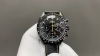 The dial of Omega Speedmaster Dark Side of the Moon "Apollo 8" is carved to imit