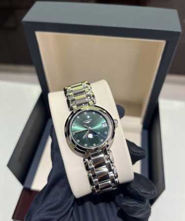 This Longines Moon phase 2000 watch features an emerald green dial, a 30.5mm cry - Click Image to Close