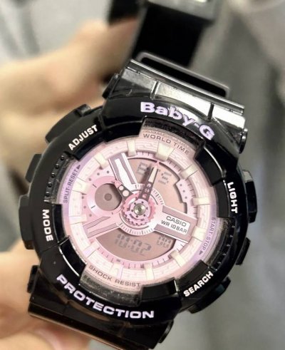 It turns out to be the black and purple of Casio Baby-G, which is the color of